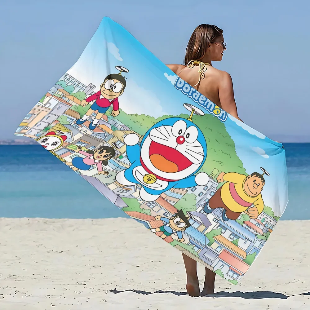 Doraemon street Beach Towel